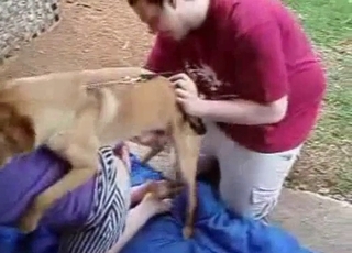 Wife pummels with her dog in front hubby