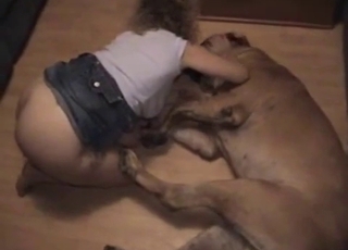 Beautiful babe is enjoying her lovely dog
