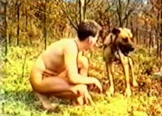 Dude seducing his own dog in the forest
