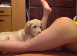 Hot lady arching her back while dog licks her