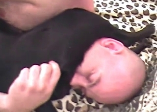 Dark-hued dog fucked by fat shaven zoofil