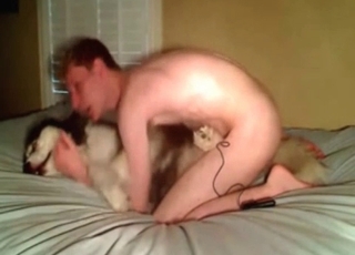 Dude is ready to fuck his dog on all fours