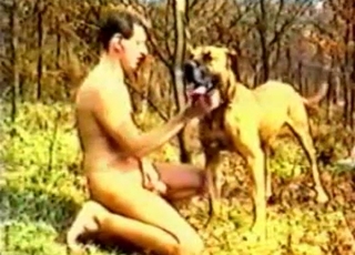 Dude seducing his own dog in the forest