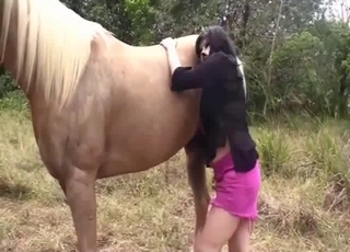 Black-haired babe and her nasty horse
