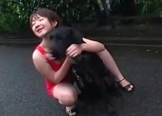 Asian chick teasing her marvelous dog