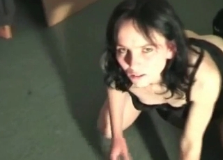Dark-haired chick drilled by a black dog